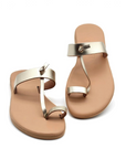 Theluto Heloïse handmade gold leather toe-ring sandals with a minimalist design, crafted in Greece.