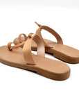 Theluto Heloïse handmade tan leather toe-ring sandals with a minimalist flat design and natural finish.