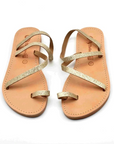 Theluto Lilou glitter sandals in gold, handcrafted from natural leather with a comfortable toe-loop design.