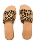 Theluto Prune Cheetah slip-on sandals featuring a bold animal print leather strap and a natural leather sole.