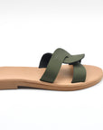 Theluto Prune olive green leather slip-on sandals with a minimalist crossover strap design, handmade in Greece.