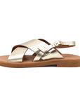 Theluto Tom gold leather sandals with minimalist crisscross straps and an adjustable buckle side view