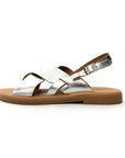 Theluto Tom silver leather sandals with a minimalist crisscross strap design and adjustable buckle side view