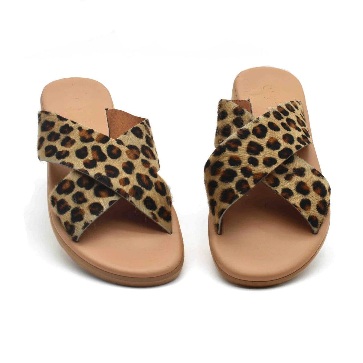 Theluto Gaelle Cheetah slip-on sandals featuring premium leopard-print leather crisscross straps and cushioned soles.