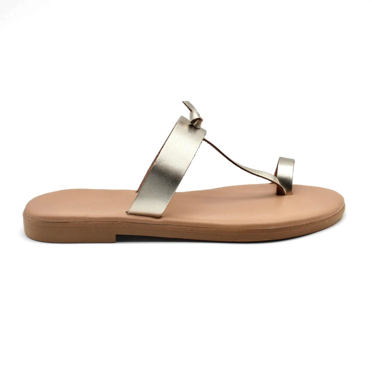 Theluto Heloïse handmade gold leather toe-ring sandals with a flat sole, crafted ethically in Greece.