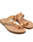 Theluto Héloïse handmade tan leather toe-loop sandals with a minimalist artisanal design, ethically made in Greece.