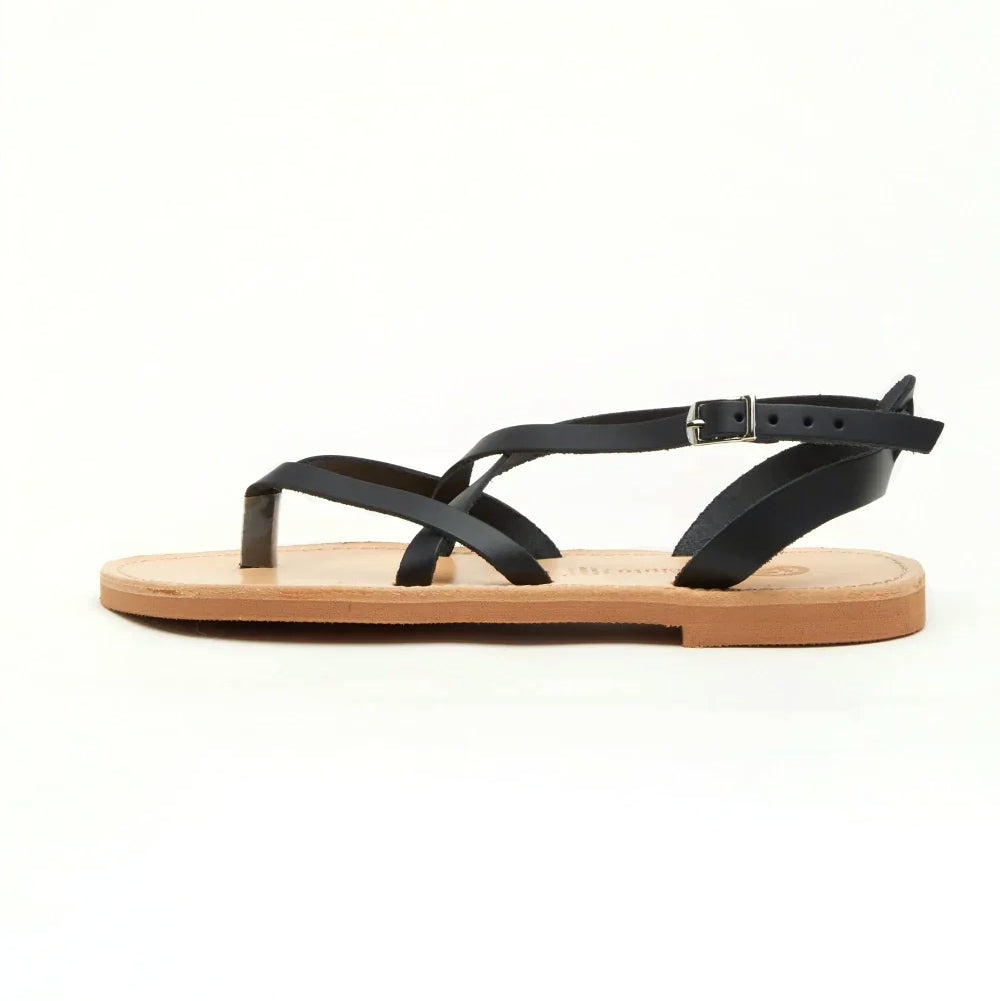 Theluto Marie minimalist black leather flat sandals with thin straps and an adjustable ankle buckle side view