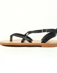 Theluto Marie minimalist black leather flat sandals with thin straps and an adjustable ankle buckle side view