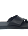 Theluto Mykonos black leather toe-loop slide sandal with a minimalist slip-on design and reinforced sole.