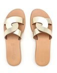 Theluto Prune handmade gold leather slip-on sandals with a chic minimalist design and tan footbed