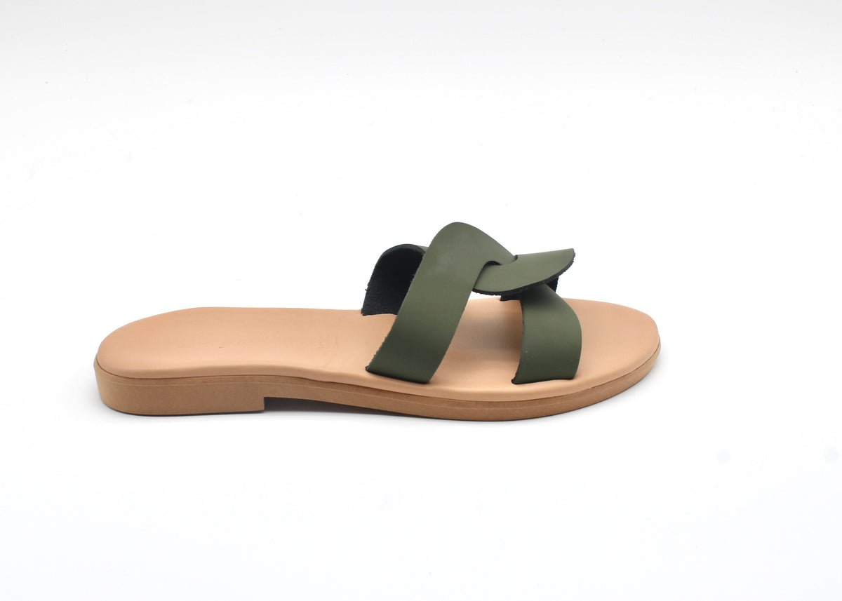 Theluto Prune olive green leather slip-on sandals with a minimalist crossover strap design, handmade in Greece.