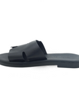 Theluto Tribeca black leather slip-on sandals with a cushioned footbed and minimalist cutout design