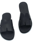 Theluto Tribeca black leather slip-on sandals with a comfortable cushioned sole and minimalist cutout design