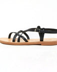 Theluto Valentine black leather strappy sandals with a flat sole and adjustable ankle strap, side view.